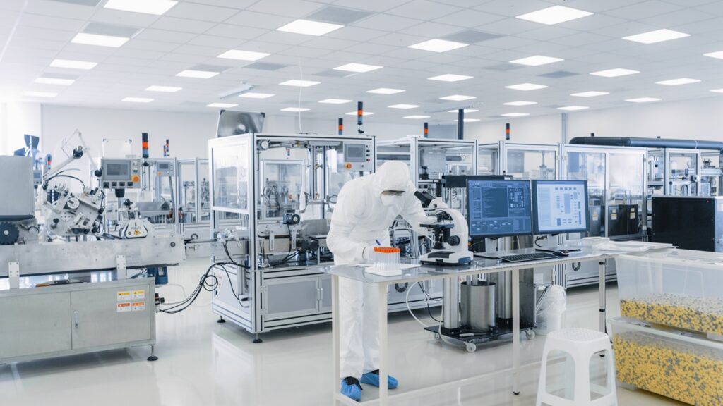 Shot,Of,Sterile,Pharmaceutical,Manufacturing,Laboratory,Where,Scientists,In,Protective