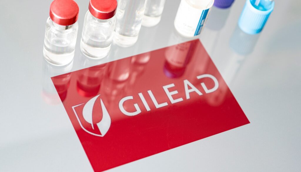 Vials,Of,Liquid,On,A,White,Table,And,The,Logo